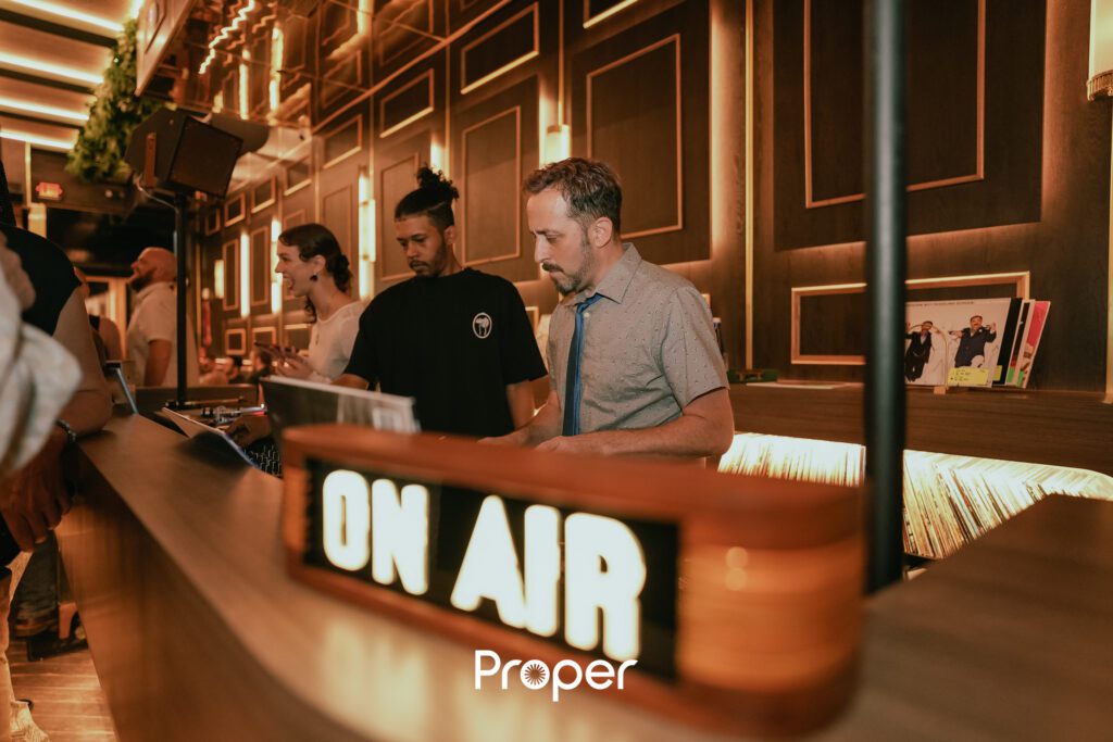 Proper Nightclub Bar Pre-Launch Header - DJ on Turntables